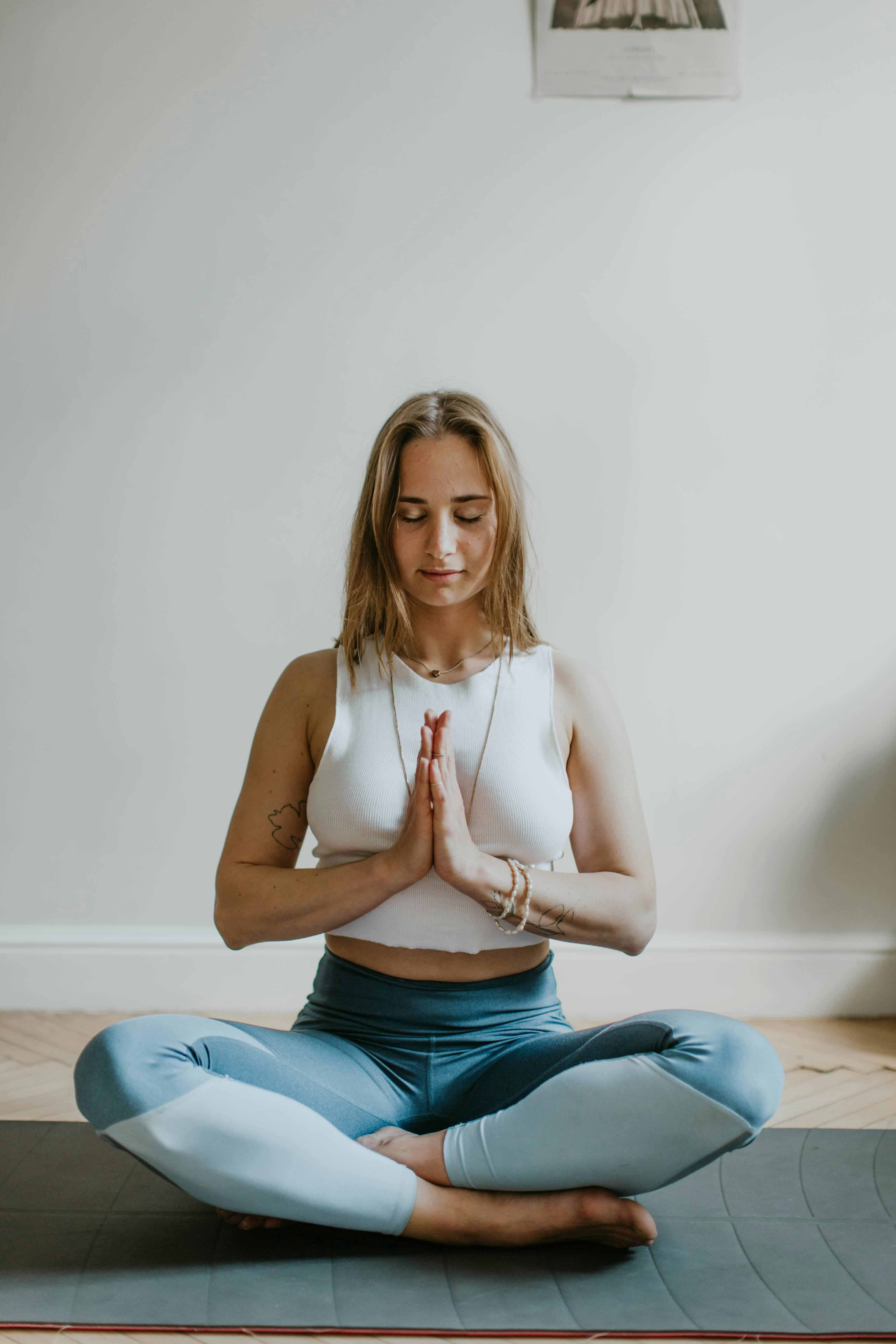 A person mediating in a room